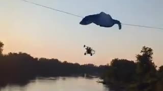 Paraglider's parachute hits high voltage line