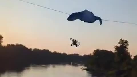 Paraglider's parachute hits high voltage line