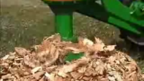 John Deere Tractor Grinding Stumps