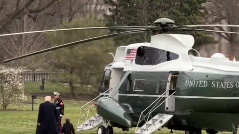 Trump walks to Marine One with Little X by his side