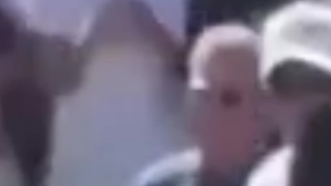 CHARLIE KIRK ASSASSINATION - Guy in the background with White T-Shirt be the shooter?