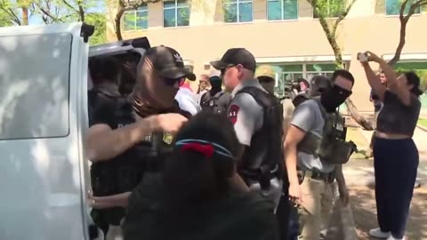 Masked federal agents now wait outside the courts to arrest illegal immigrants.