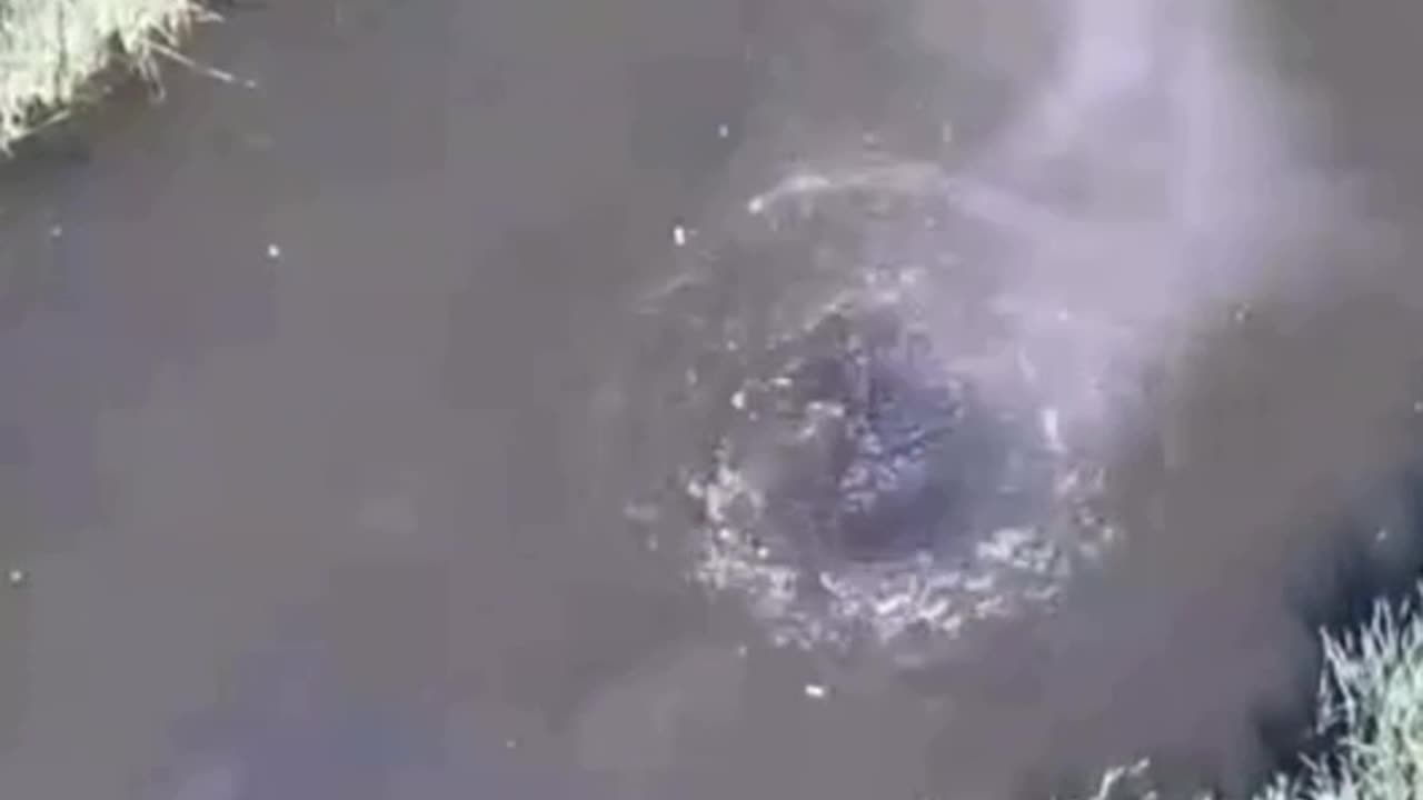 Probing Russian Soldier Floating Down River