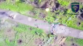 Russian Mechanized Column With Mine Clearing Vehicles Attempting to Break Through Ukrainian Border