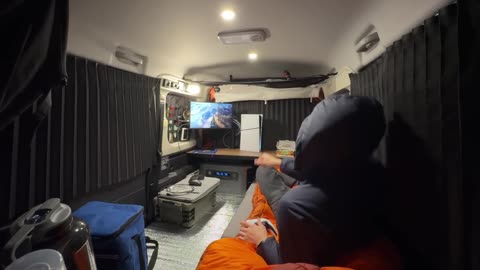Gaming car camping in a light van
