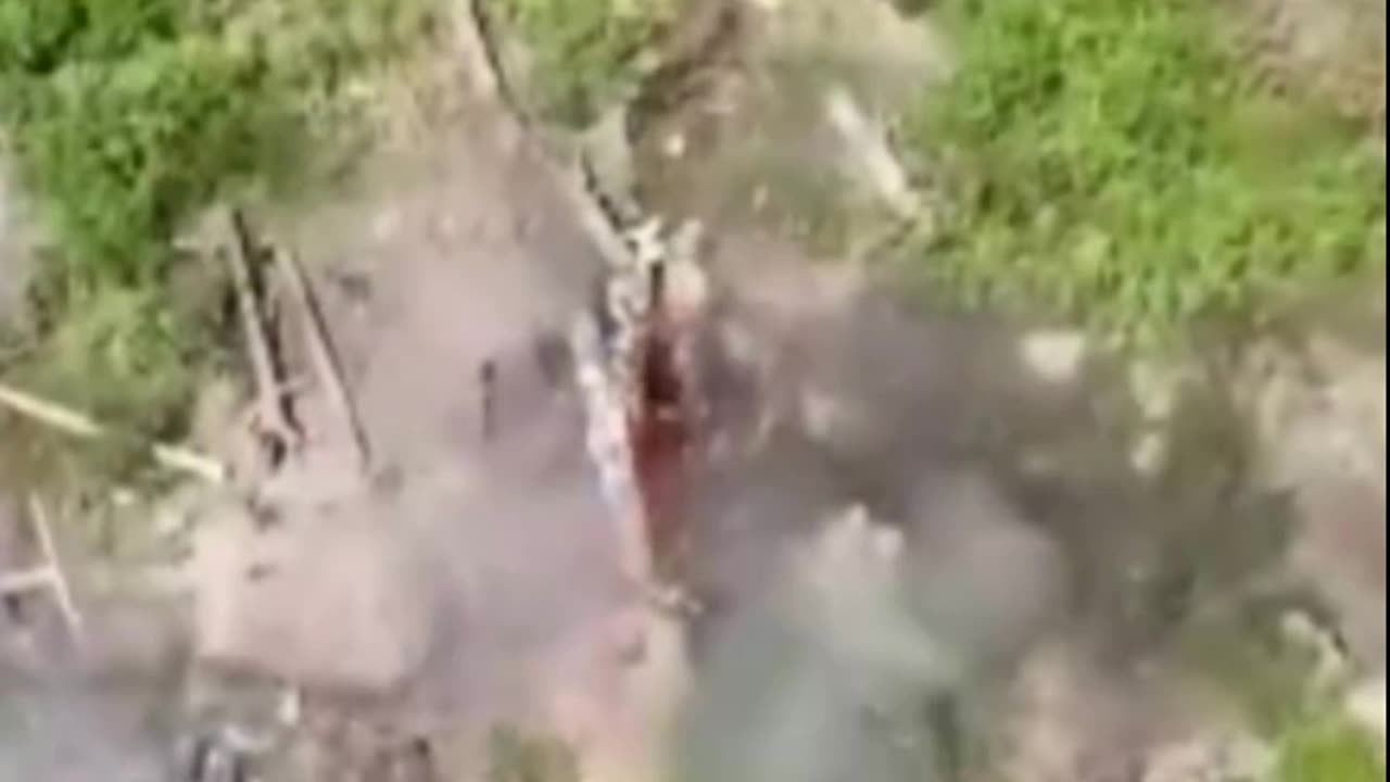 Dropping Grenades Onto a Pile of ATGMs Inside Russian Trench