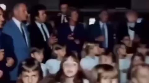 Trump at a jewish auction for young White children with his boy, jeff.