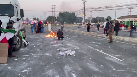 Rioters in Los Angeles are now filling up buckets and bottles with some sort of flammable liquid.