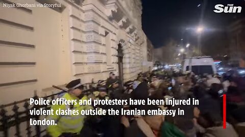Protesters injured in VIOLENT clashes with cops outside Iranian embassy in London