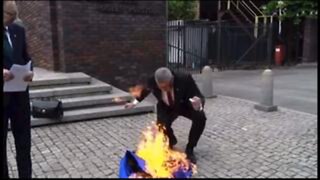 Polish MP Grzegorz Braun tears down EU flag; wipes his shoes on it, and then burns it!!!