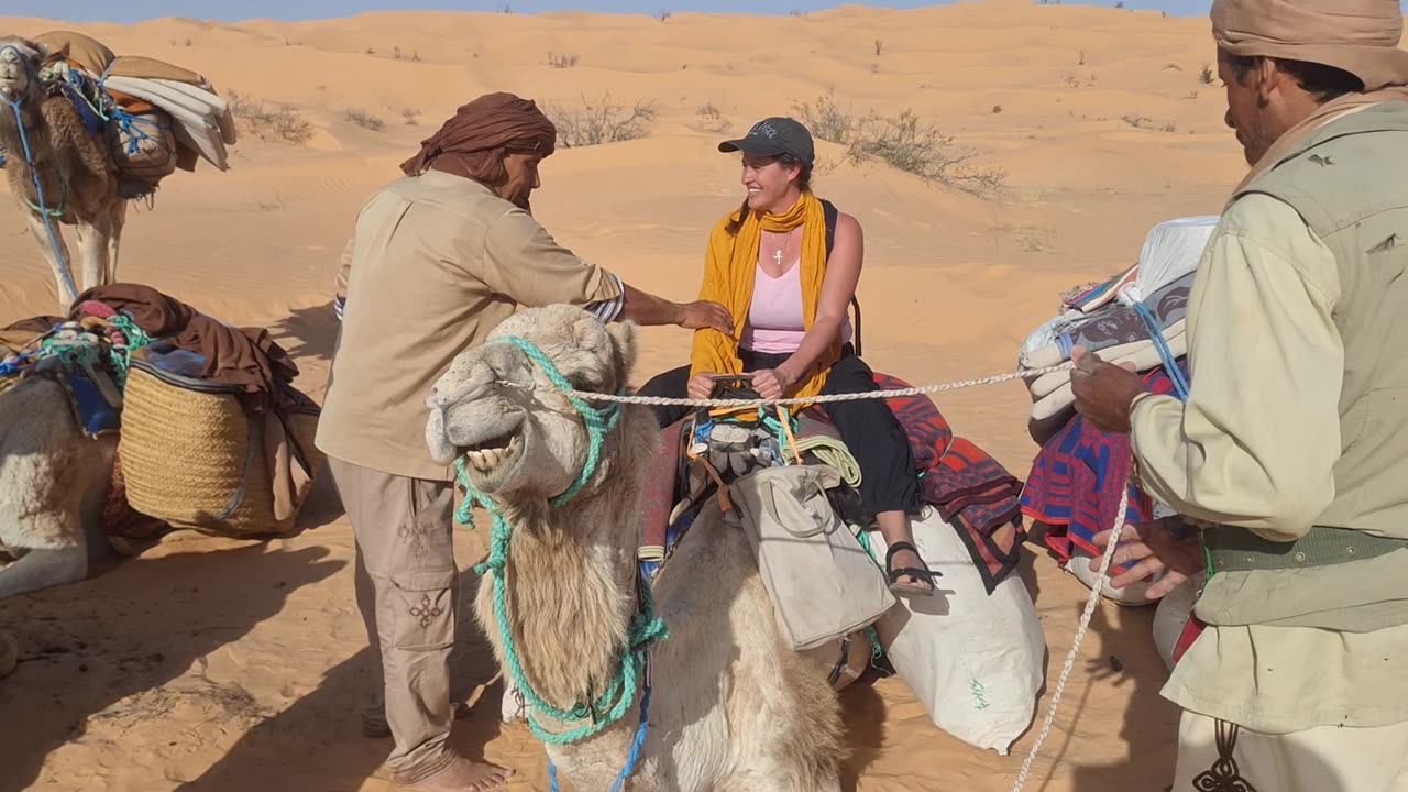 Samantha mounts a camel, April 5, 2025