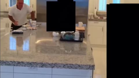 Bizarre video of Jeffrey Epstein chasing what sounds like young girls around his kitchen