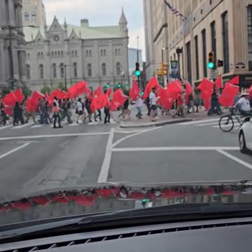 500 protesters carrying communist flags are marching in Philadelphia