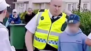 Police arrest an 8 year old boy and his friend for waving the English flag
