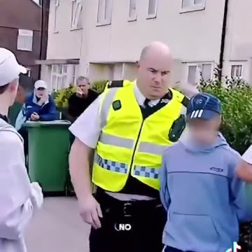 Police arrest an 8 year old boy and his friend for waving the English flag