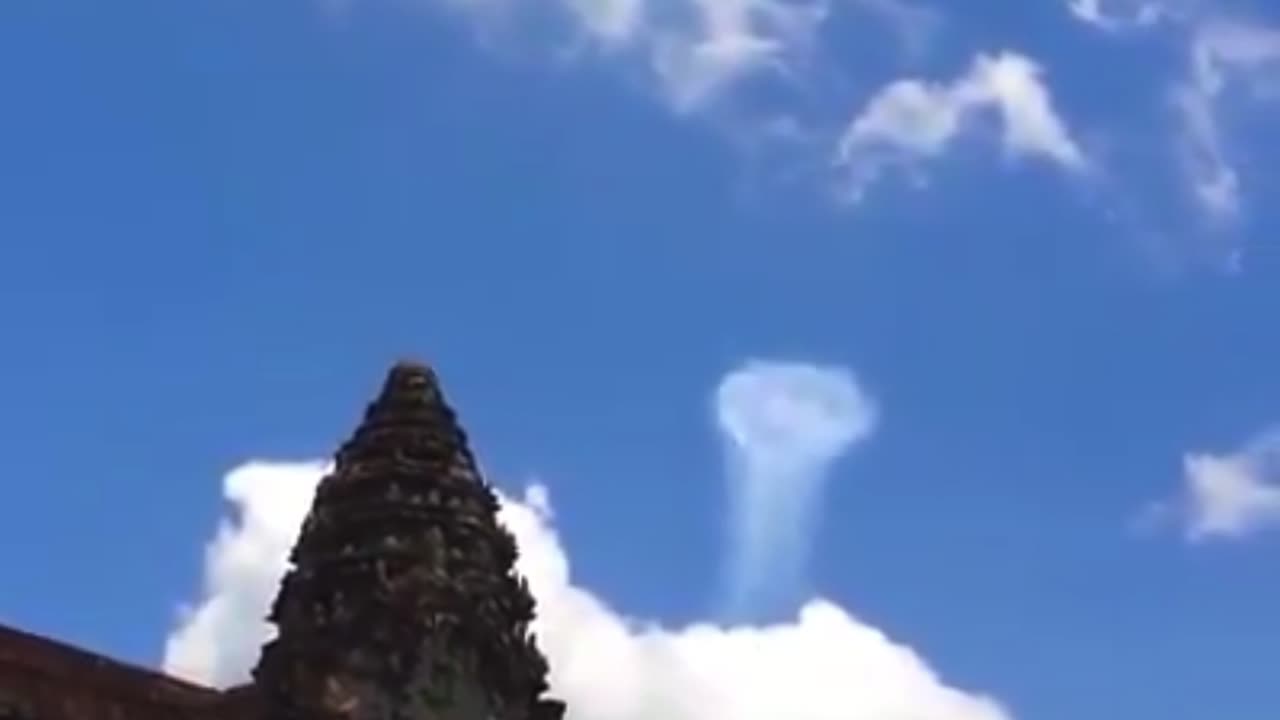 UFO/UAP APPEARS THROUGH PORTAL AT ANGKOR WAT TEMPLE