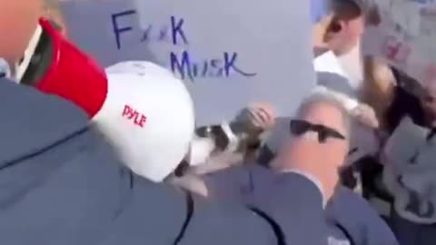 Alex Jones vs. Leftists at Tesla: Epic Confrontation!