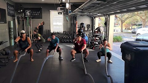 Battle Rope Uni-lateral Waves from Squat Position