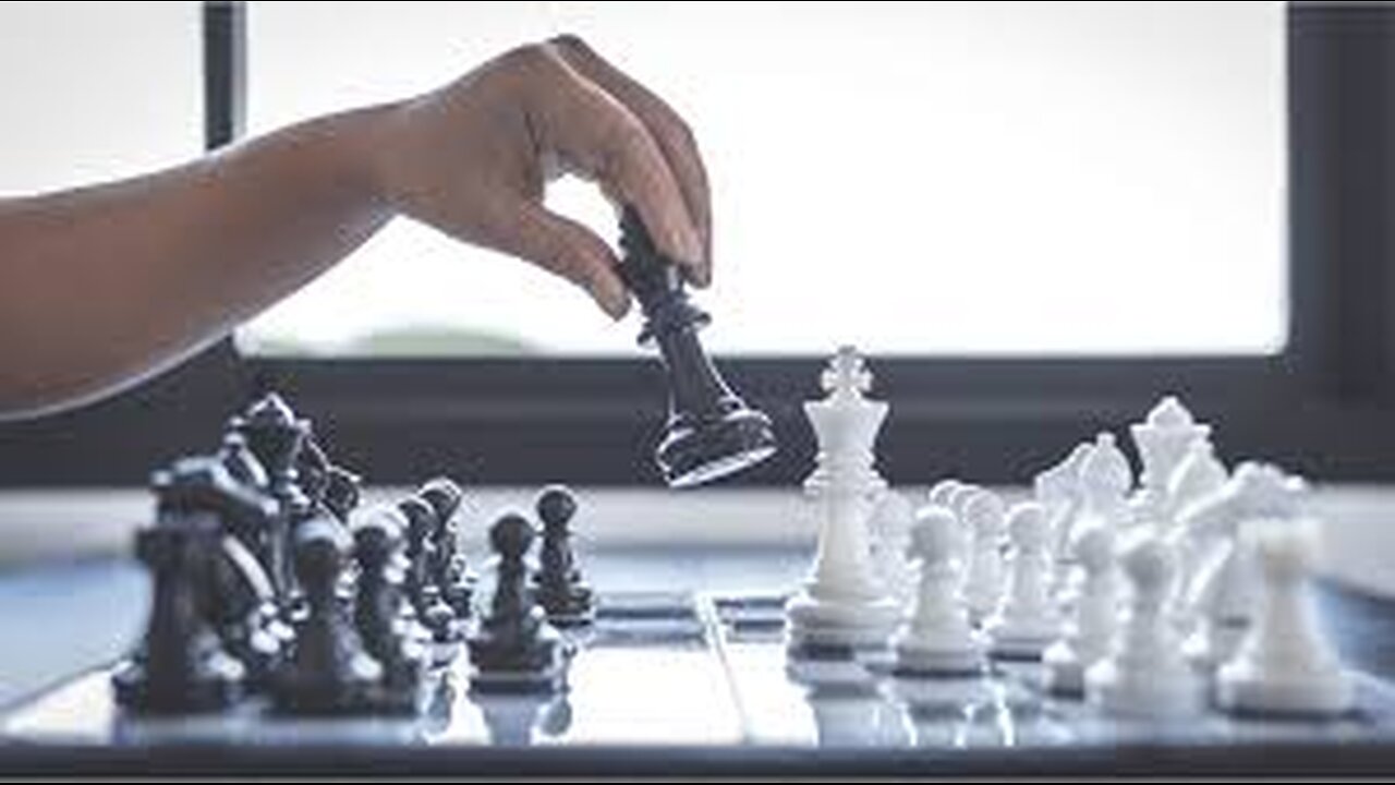 Playing Chess between looking through the news