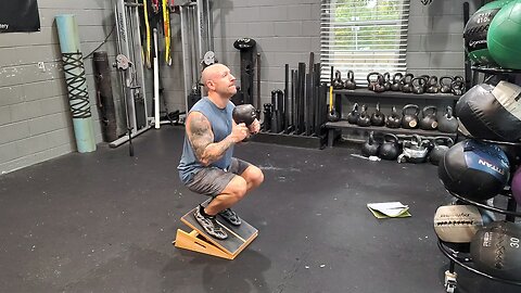 Slant Board Knees Over Toes Squat