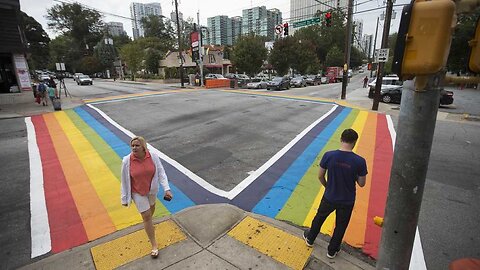 Brush Rush: FL Residents Are Painting LGBTQIA+ Symbols On Their Driveways Instead Of Public Streets