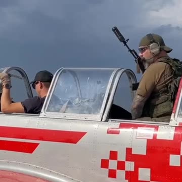 Russians shoot at drones with rifles directly from aircraft. Air combat like a hundred years ago.