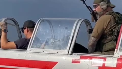 Russians shoot at drones with rifles directly from aircraft. Air combat like a hundred years ago.