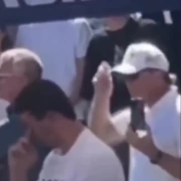 Charlie kirk white baseball hat hand signals