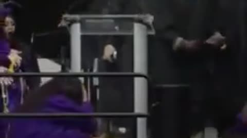 More Black Graduation Idiocy Graduate Backflips Into Another's Face