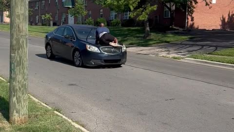 Columbus Man Clings to Screeching Car Hood