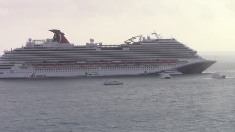 Cruise Ship Docked in Ocean with Dingy Boats Creative Commons Stock Video