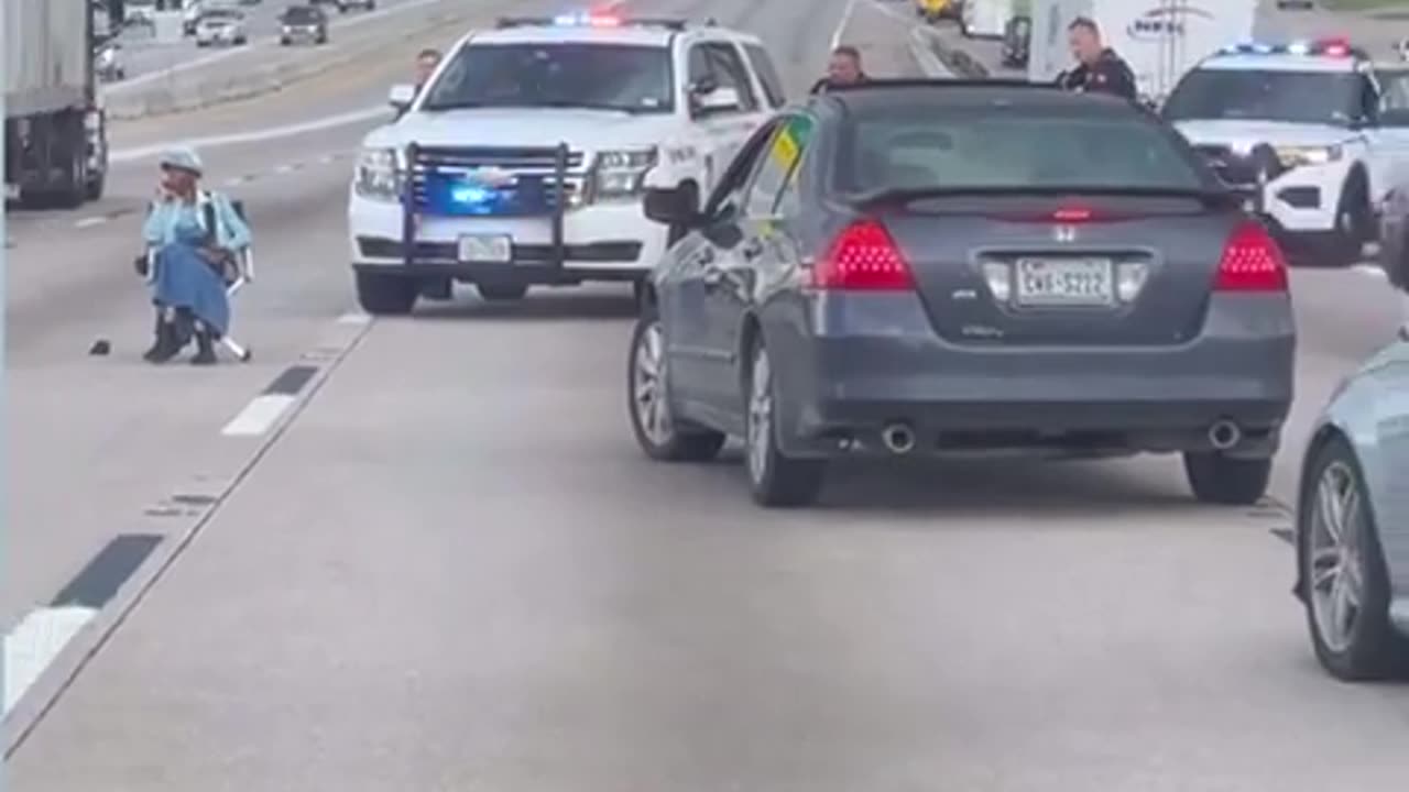 Old lady hits 18 wheeler then sits in the middle of the highway with a gun - Houston, TX