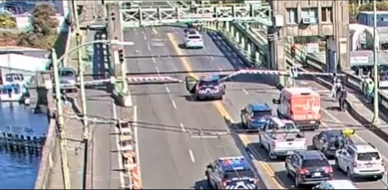 Driver Jumps Open Bridge Trying To Avoid Cops