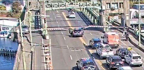 Driver Jumps Open Bridge Trying To Avoid Cops