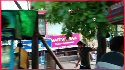 soak in the lively urban vibe. #AsianCity #StreetMarket #ShopLocal