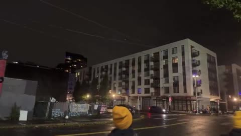 Lights are OFF at the apartment building across from the Portland ICE facility.