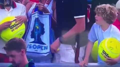 A Polish millionaire CEO and businessman was exposed after grabbing a tennis star’s hat that was being given to a child