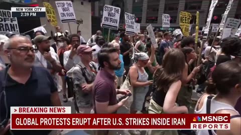 Thousands flood Times Square in a massive anti-war protest