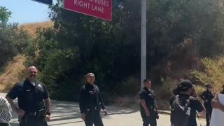 Protesters gathered Thursday at Gate E of Dodger Stadium in Los Angeles, California,