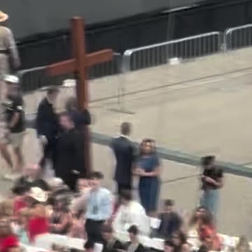 Giant Cross Carried into Stadium for Charlie Kirk Memorial