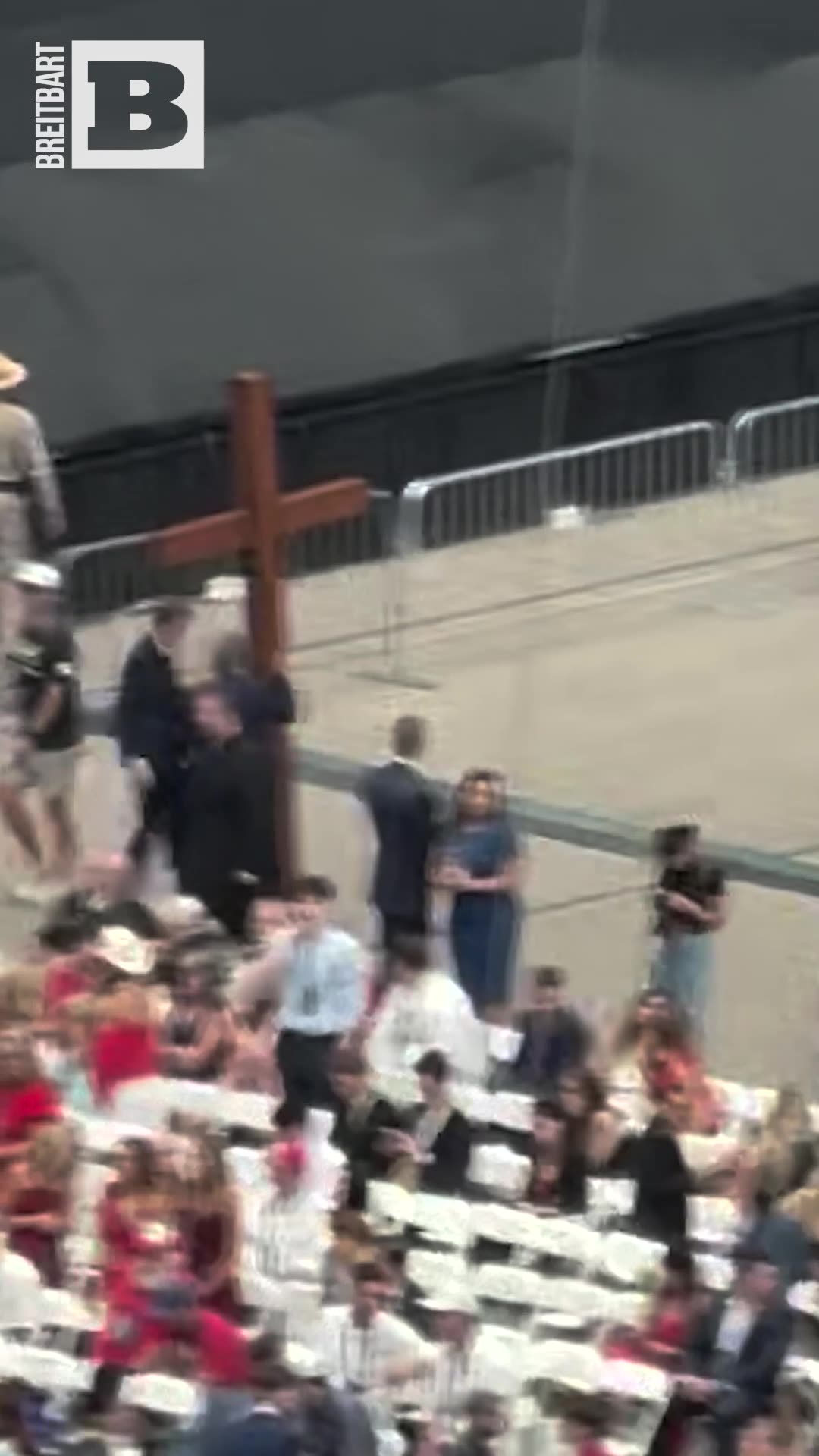 Giant Cross Carried into Stadium for Charlie Kirk Memorial