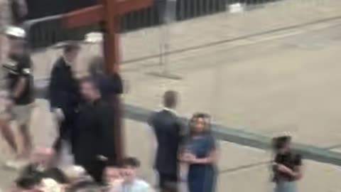 Giant Cross Carried into Stadium for Charlie Kirk Memorial