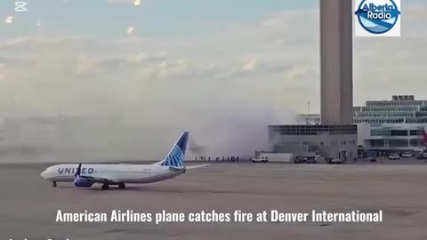 AMERICA AIRLINES CATCHES FIRE AT DENVER AIRPORT