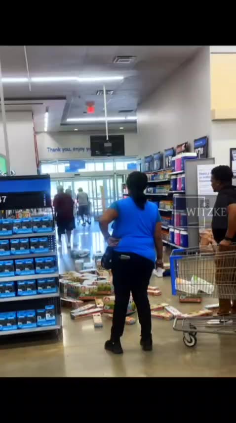 A Black man is throwing a temper tantrum in Walmart because he can't shoplift in peace.