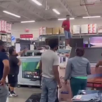 Skitzo Black Knocks Over TVs In Department Store