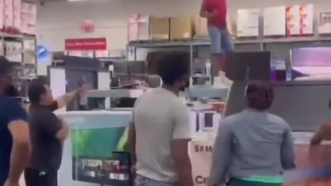 Skitzo Black Knocks Over TVs In Department Store