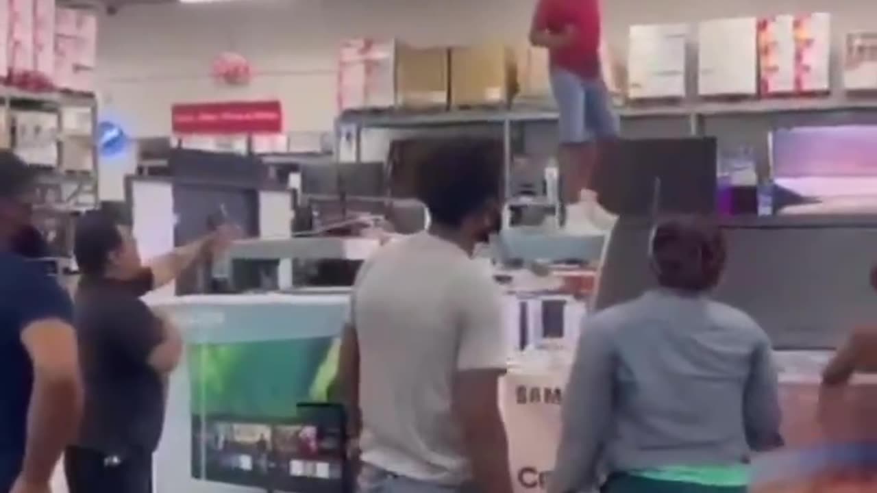 Skitzo Black Knocks Over TVs In Department Store