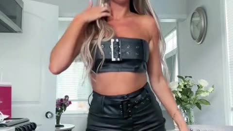 How do you like this leather outfit on me