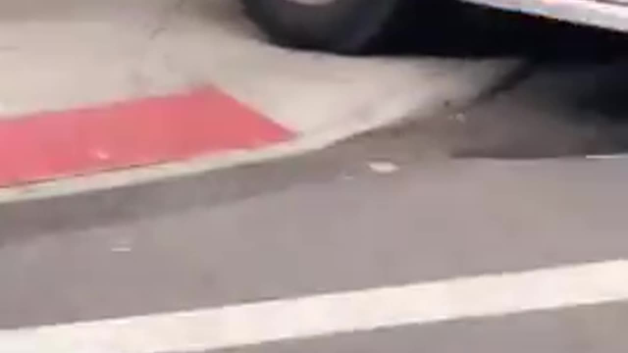 Dumb negro trucker takes out fire hydrant and cars trying to turn in crap-hole Jew York