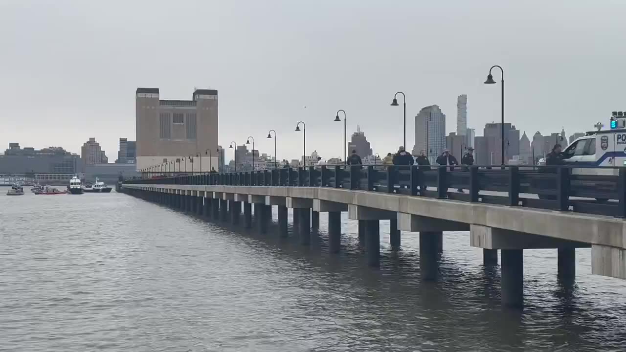 Rescue efforts underway after helicopter crashes into the Hudson River in New York.